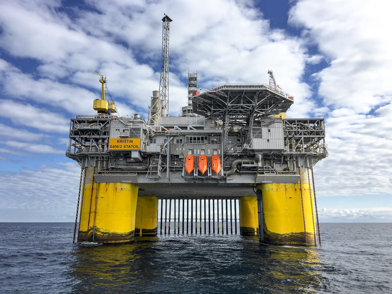 Mastering the First Impression: Your intriguing post title goes here Majestic offshore oil platform in Norway's North Sea, under blue skies.